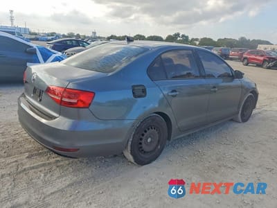 Trzecie zdjęcie samochodu z tyłu: 2015 VOLKSWAGEN JETTA BASE VIN:3VW2K7AJ5FM284778 - miniatura