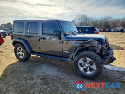 Czwarte zdjęcie samochodu z boku: 2017 JEEP WRANGLER UNLIMITED SAHARA VIN:1C4BJWEG1HL686509 - miniatura
