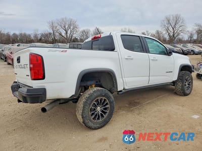 Trzecie zdjęcie samochodu z tyłu: 2022 CHEVROLET COLORADO ZR2 VIN:1GCPTEE10N1125831 - miniatura