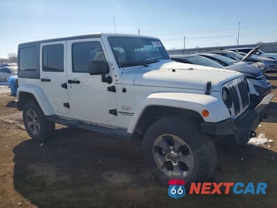 Czwarte zdjęcie samochodu z boku: 2015 JEEP WRANGLER UNLIMITED SAHARA VIN:1C4BJWEG9FL718118 - miniatura