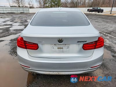 Zdjęcie 6 z 12 samochodu: 2014 BMW 320 VIN:WBA3C3G56ENS68663 - miniatura