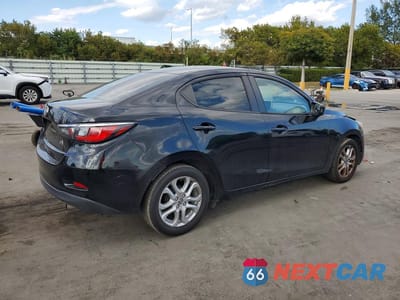 Trzecie zdjęcie samochodu z tyłu: 2016 TOYOTA SCION IA VIN:3MYDLBZV3GY106091 - miniatura