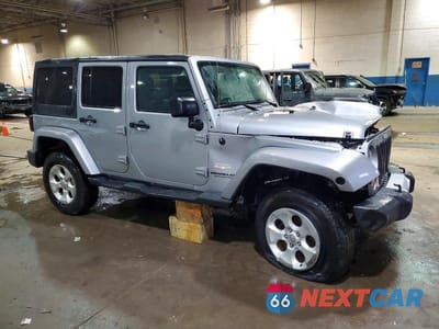 Czwarte zdjęcie samochodu z boku: 2013 JEEP WRANGLER UNLIMITED SAHARA VIN:1C4BJWEG0DL560796 - miniatura