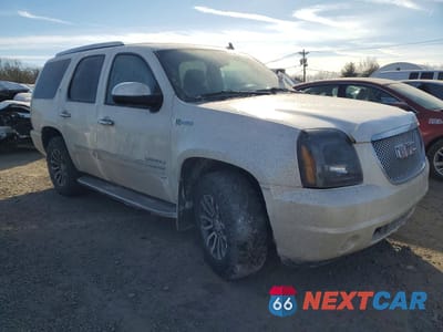 Czwarte zdjęcie samochodu z boku: 2012 GMC YUKON DENALI HYBRID VIN:1GKS2GEJ3CR222808 - miniatura