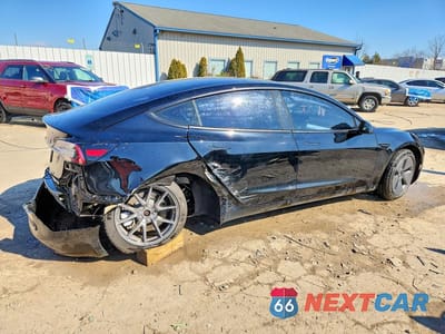 Trzecie zdjęcie samochodu z tyłu: 2023 TESLA MODEL 3 VIN:5YJ3E1EAXPF382569 - miniatura