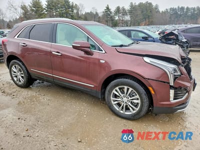 Czwarte zdjęcie samochodu z boku: 2022 CADILLAC XT5 PREMIUM LUXURY VIN:1GYKNDRS4NZ174558 - miniatura