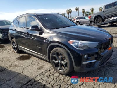 Czwarte zdjęcie samochodu z boku: 2018 BMW X1 SDRIVE28I VIN:WBXHU7C39J5H42462 - miniatura
