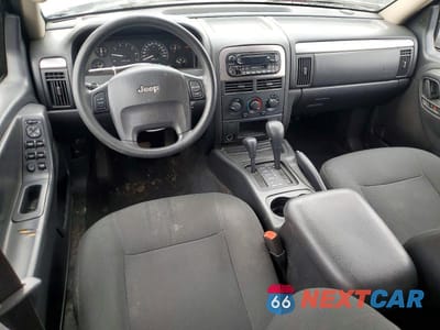 Zdjęcie 8 z 13 samochodu: 2003 JEEP GRAND CHEROKEE LAREDO VIN:1J4GW48S53C563004 - miniatura