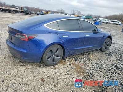 Trzecie zdjęcie samochodu z tyłu: 2019 TESLA MODEL 3 VIN:5YJ3E1EA1KF299492 - miniatura
