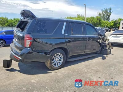 Trzecie zdjęcie samochodu z tyłu: 2023 CHEVROLET TAHOE C1500 LT VIN:1GNSCNKD5PR235004 - miniatura