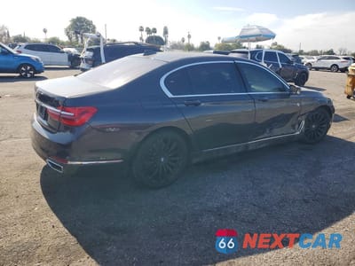 Trzecie zdjęcie samochodu z tyłu: 2018 BMW 740 I VIN:WBA7E2C57JG743361 - miniatura