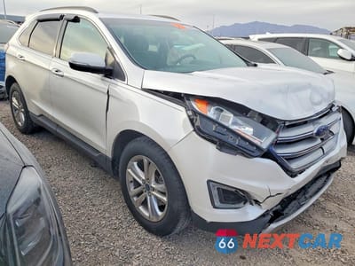 Czwarte zdjęcie samochodu z boku: 2015 FORD EDGE SEL VIN:2FMTK3J82FBB71073 - miniatura