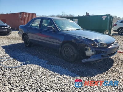 Czwarte zdjęcie samochodu z boku: 1994 TOYOTA CAMRY LE VIN:4T1SK12E7RU348154 - miniatura