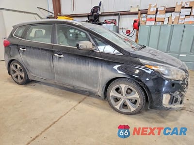 Czwarte zdjęcie samochodu z boku: 2016 KIA RONDO VIN:KNAHU8A35G7134273 - miniatura