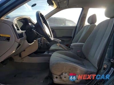 Zdjęcie 7 z 13 samochodu: 2003 HYUNDAI ELANTRA GLS VIN:KMHDN45D53U615576 - miniatura
