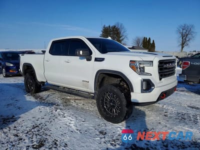 Czwarte zdjęcie samochodu z boku: 2019 GMC SIERRA K1500 AT4 VIN:1GTP9EED9KZ336273 - miniatura