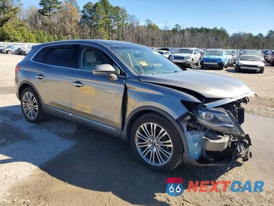 Czwarte zdjęcie samochodu z boku: 2016 LINCOLN MKX RESERVE VIN:2LMTJ6LP1GBL49876 - miniatura