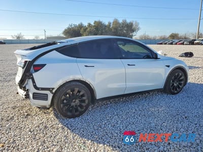 Trzecie zdjęcie samochodu z tyłu: 2023 TESLA MODEL Y VIN:7SAYGAEE7PF805761 - miniatura