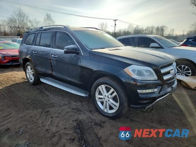 Czwarte zdjęcie samochodu z boku: 2014 MERCEDES-BENZ GL 450 4MATIC VIN:4JGDF7CE3EA383607 - miniatura