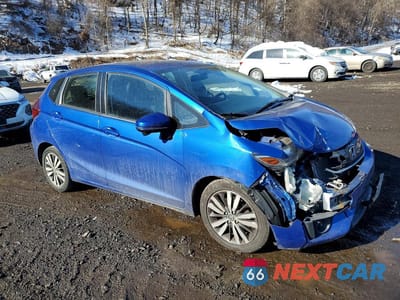 Czwarte zdjęcie samochodu z boku: 2016 HONDA FIT EX VIN:JHMGK5H7XGS006828 - miniatura