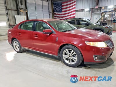 Czwarte zdjęcie samochodu z boku: 2010 LINCOLN MKS VIN:1LNHL9DR0AG610511 - miniatura