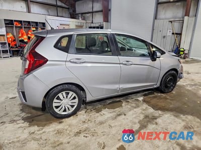 Trzecie zdjęcie samochodu z tyłu: 2017 HONDA FIT LX VIN:JHMGK5H59HS002561 - miniatura