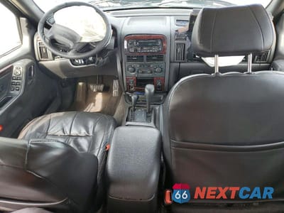 Zdjęcie 8 z 12 samochodu: 2001 JEEP GRAND CHEROKEE LIMITED VIN:1J4GW58N91C616378 - miniatura