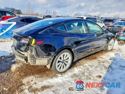 Trzecie zdjęcie samochodu z tyłu: 2022 TESLA MODEL 3 VIN:5YJ3E1EBXNF320269 - miniatura