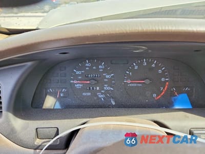 Zdjęcie 9 z 11 samochodu: 1999 NISSAN ALTIMA XE VIN:1N4DL01DXXC240570 - miniatura