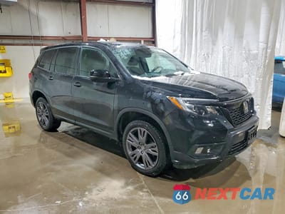 Czwarte zdjęcie samochodu z boku: 2021 HONDA PASSPORT EXL VIN:5FNYF8H58MB030418 - miniatura