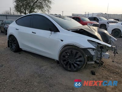 Czwarte zdjęcie samochodu z boku: 2023 TESLA MODEL Y VIN:7SAYGDEE2PA038481 - miniatura
