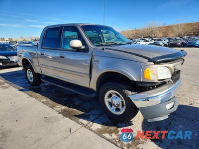 Czwarte zdjęcie samochodu z boku: 2001 FORD F150 SUPERCREW VIN:1FTRW08L11KB55604 - miniatura