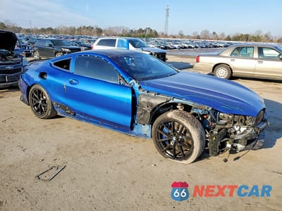 Czwarte zdjęcie samochodu z boku: 2019 BMW M850XI VIN:WBABC4C58KBU95843 - miniatura