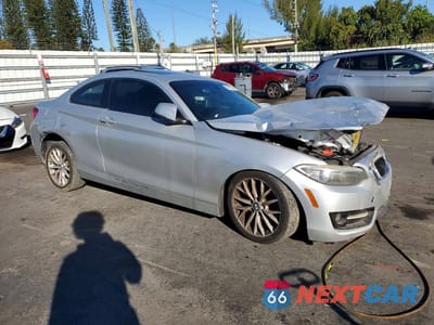 Czwarte zdjęcie samochodu z boku: 2016 BMW 228 I SULEV VIN:WBA1F9C57GV546335 - miniatura