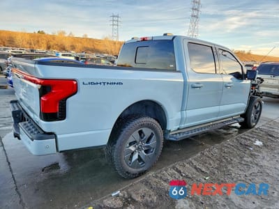 Trzecie zdjęcie samochodu z tyłu: 2023 FORD F150 LIGHTNING PRO VIN:1FTVW1EL6PWG20565 - miniatura