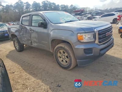 Czwarte zdjęcie samochodu z boku: 2018 GMC CANYON VIN:1GTG5BEA5J1109031 - miniatura