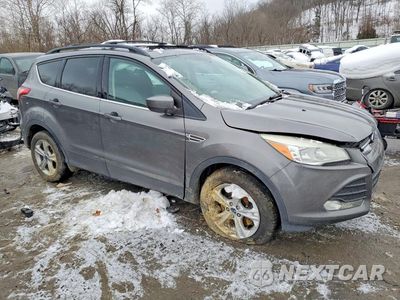 Czwarte zdjęcie samochodu z boku: 2014 FORD ESCAPE SE VIN:1FMCU9GX7EUE32119 - miniatura