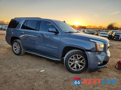 Czwarte zdjęcie samochodu z boku: 2016 GMC YUKON SLT VIN:1GKS2BKC2GR298714 - miniatura
