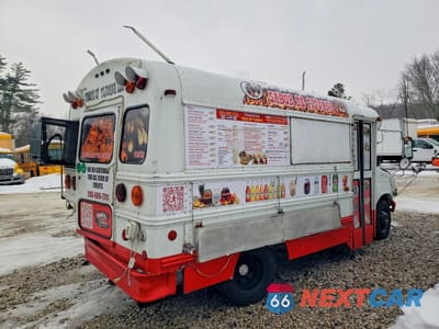 Trzecie zdjęcie samochodu z tyłu: 2002 FORD ECONOLINE E350 SUPER DUTY CUTAWAY VAN VIN:1FDSE35F22HA82659 - miniatura