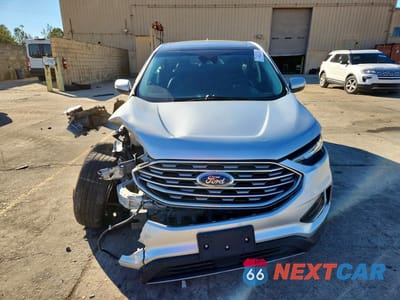 Piąte zdjęcie samochodu w środku: 2019 FORD EDGE TITANIUM VIN:2FMPK4K95KBC70687 - miniatura