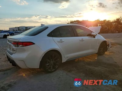 Trzecie zdjęcie samochodu z tyłu: 2024 TOYOTA COROLLA HYBRID SE VIN:JTDBDMHE2RJ004840 - miniatura