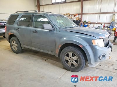 Czwarte zdjęcie samochodu z boku: 2010 FORD ESCAPE XLT VIN:1FMCU0D72AKD22889 - miniatura
