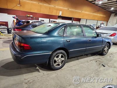 Trzecie zdjęcie samochodu z tyłu: 1999 TOYOTA AVALON VIN:4T1BF18B4XU298392 - miniatura