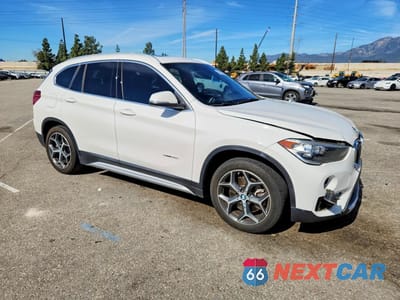 Czwarte zdjęcie samochodu z boku: 2018 BMW X1 SDRIVE28I VIN:WBXHU7C31J5H39104 - miniatura
