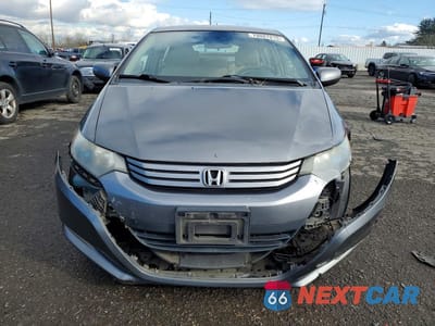 Piąte zdjęcie samochodu w środku: 2010 HONDA INSIGHT LX VIN:JHMZE2H51AS043450 - miniatura