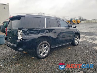Trzecie zdjęcie samochodu z tyłu: 2019 CHEVROLET TAHOE K1500 LT VIN:1GNSKBKC8KR106742 - miniatura