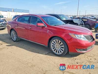 Czwarte zdjęcie samochodu z boku: 2013 LINCOLN MKS VIN:1LNHL9EK8DG618829 - miniatura