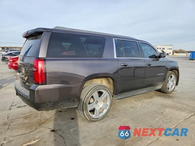 Trzecie zdjęcie samochodu z tyłu: 2016 CHEVROLET SUBURBAN C1500 LT VIN:1GNSCHKC0GR372358 - miniatura