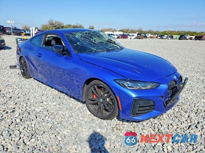 Czwarte zdjęcie samochodu z boku: 2022 BMW M440I VIN:WBA83AP0XNCK23977 - miniatura