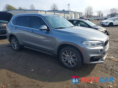 Czwarte zdjęcie samochodu z boku: 2018 BMW X5 XDR40E VIN:5UXKT0C52J0V99846 - miniatura